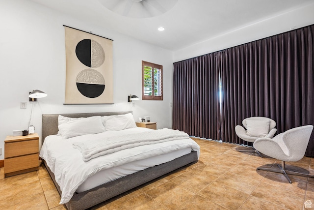 2090 N Tuweap Dr Unit 9, St George, UT 84770 - bedroom with light tile patterned flooring and recessed lighting
