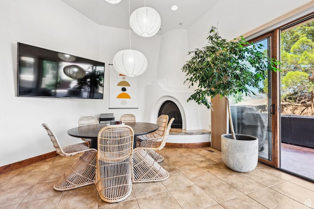 2090 N Tuweap Dr Unit 9, St George, UT 84770 - tiled dining space featuring baseboards