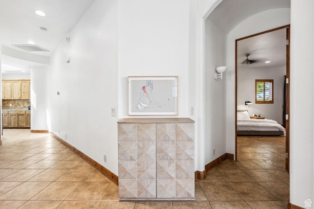 2090 N Tuweap Dr Unit 9, St George, UT 84770 - hall featuring light tile patterned floors, baseboards, and recessed lighting