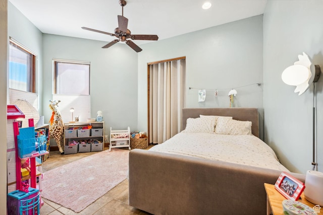 2090 N Tuweap Dr Unit 9, St George, UT 84770 - bedroom with tile patterned floors and ceiling fan