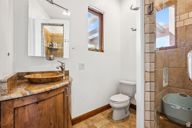 2090 N Tuweap Dr Unit 9, St George, UT 84770 - bathroom with plenty of natural light, vanity, toilet, and tile patterned flooring