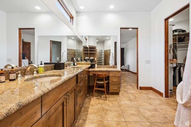 2090 N Tuweap Dr Unit 9, St George, UT 84770 - full bath featuring double vanity, tile patterned floors, a spacious closet, baseboards, and recessed lighting