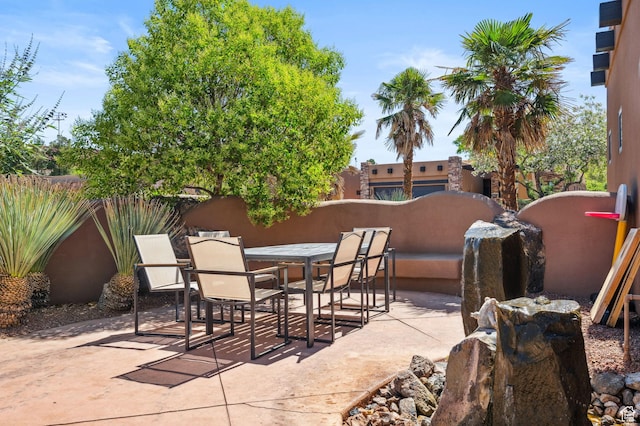 2090 N Tuweap Dr Unit 9, St George, UT 84770 - view of patio featuring outdoor dining space