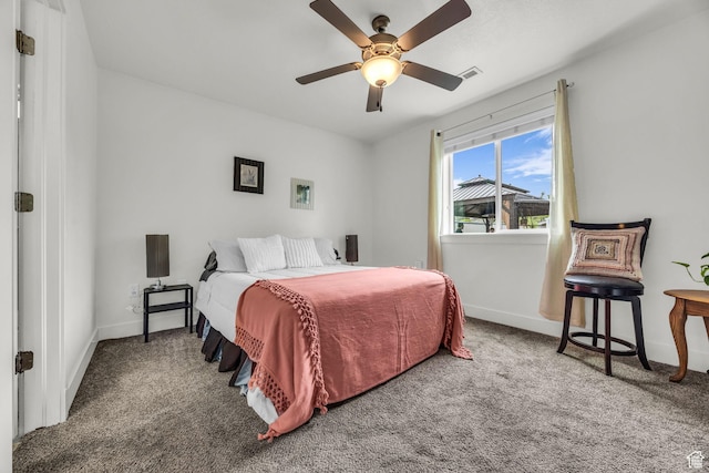 161 E 27th St S, Ogden, UT 84401 - carpeted bedroom with baseboards and ceiling fan