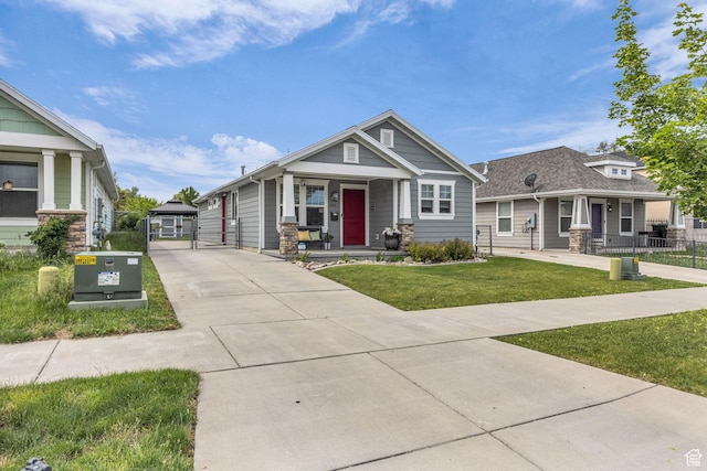161 E 27th St S, Ogden, UT 84401 - craftsman-style house featuring covered porch and driveway