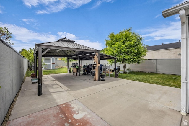 161 E 27th St S, Ogden, UT 84401 - fenced backyard featuring a gazebo, a patio area, and outdoor dining area