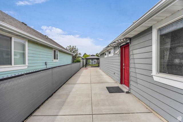 161 E 27th St S, Ogden, UT 84401 - view of side of property featuring a patio area