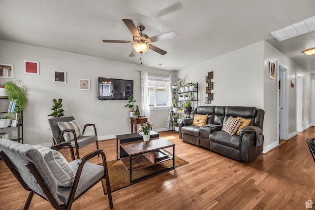 161 E 27th St S, Ogden, UT 84401 - living area featuring a ceiling fan, light wood finished floors, and baseboards