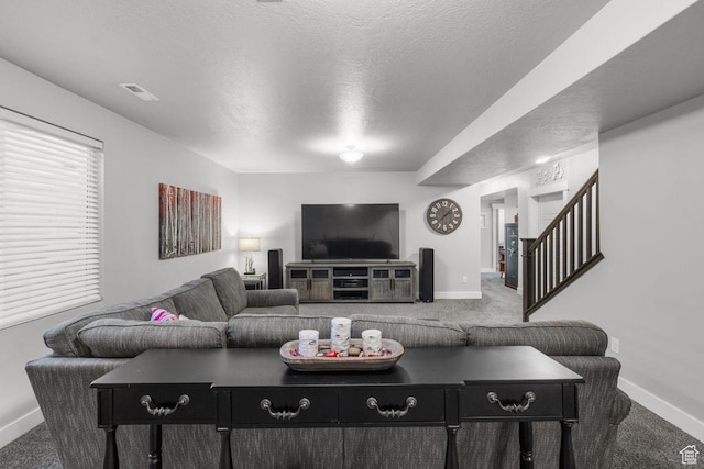 3498 W Harvestwood Ln S, Riverton, UT 84065 - living room with carpet flooring, baseboards, stairs, and a textured ceiling
