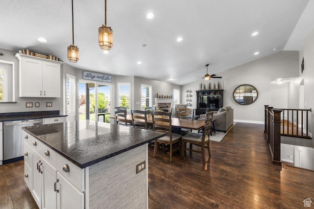 3498 W Harvestwood Ln S, Riverton, UT 84065 - kitchen with stainless steel dishwasher, ceiling fan, dark wood finished floors, recessed lighting, and a kitchen island