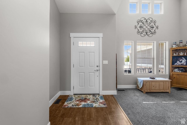 3498 W Harvestwood Ln S, Riverton, UT 84065 - foyer entrance featuring baseboards and dark wood-style floors
