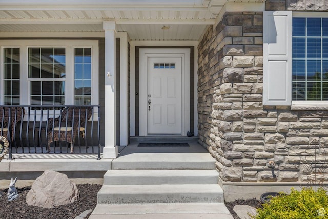 3498 W Harvestwood Ln S, Riverton, UT 84065 - doorway to property featuring stone siding