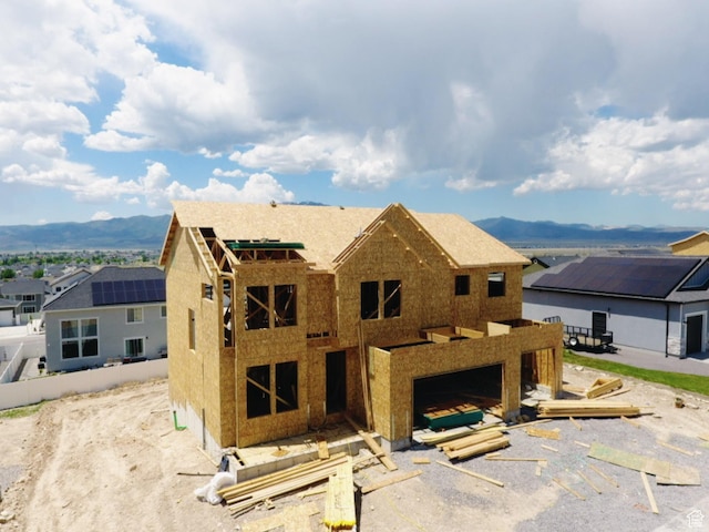 4171 N Ophir Dr Unit 408, Eagle Mountain, UT 84005 - view of front of house with an attached garage and a mountain view