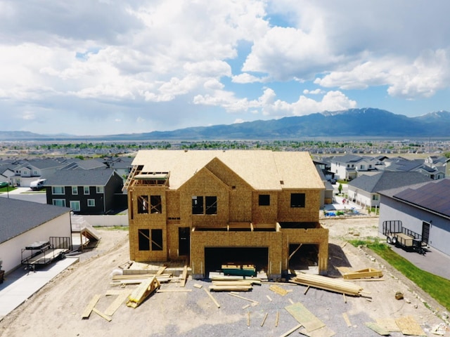 4171 N Ophir Dr Unit 408, Eagle Mountain, UT 84005 - view of front facade with a residential view, a mountain view, and a garage