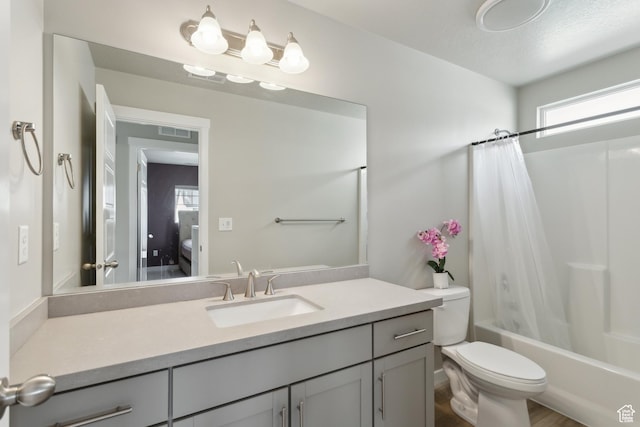 4254 E Center Point St, Eagle Mountain, UT 84005 - bathroom featuring shower / bath combination with curtain, toilet, and vanity