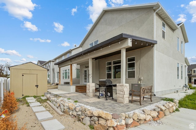 4254 E Center Point St, Eagle Mountain, UT 84005 - rear view of house featuring a patio area and stucco siding