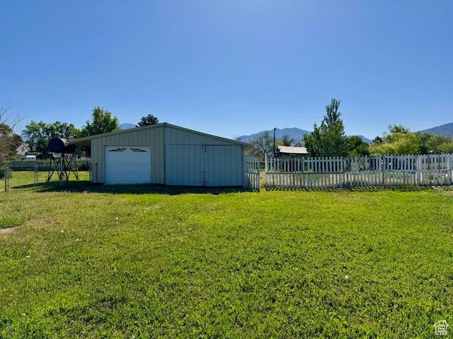 30 E 300 S, Fillmore, UT 84631 - view of yard with a detached garage, an outbuilding, and a mountain view