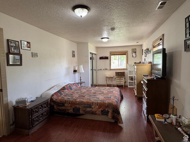 30 E 300 S, Fillmore, UT 84631 - bedroom with wood finished floors and a textured ceiling