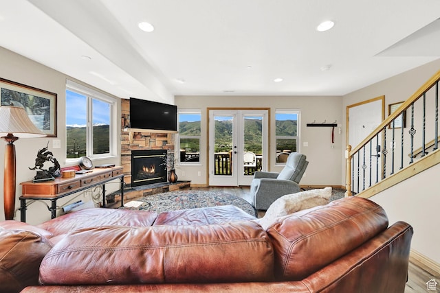 5063 E Lakeview Dr Unit 1001, Eden, UT 84310 - living room featuring wood finished floors, french doors, baseboards, recessed lighting, and stairway