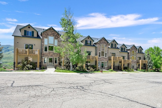 5063 E Lakeview Dr Unit 1001, Eden, UT 84310 - townhome / multi-family property with stone siding and a residential view