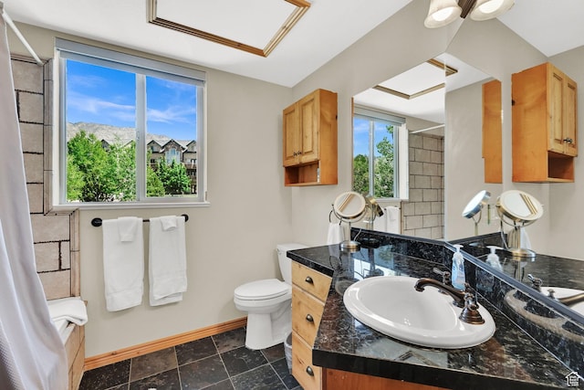 5063 E Lakeview Dr Unit 1001, Eden, UT 84310 - full bathroom with baseboards, vanity, toilet, and shower / tub combo