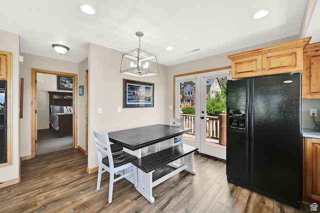 5063 E Lakeview Dr Unit 1001, Eden, UT 84310 - dining space with french doors, wood finished floors, a chandelier, recessed lighting, and baseboards