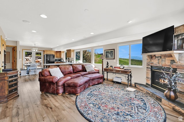 5063 E Lakeview Dr Unit 1001, Eden, UT 84310 - living room featuring plenty of natural light, light wood-type flooring, a fireplace, and recessed lighting