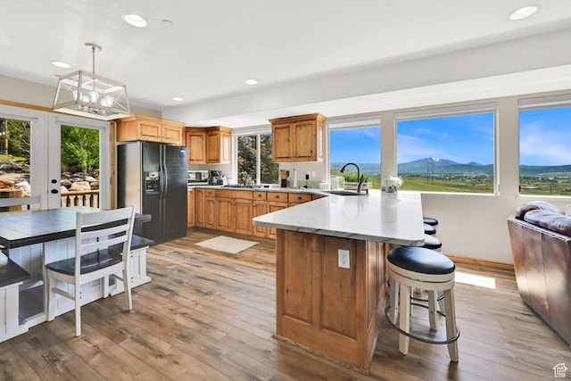 5063 E Lakeview Dr Unit 1001, Eden, UT 84310 - kitchen with stainless steel appliances, a peninsula, a sink, healthy amount of natural light, and recessed lighting