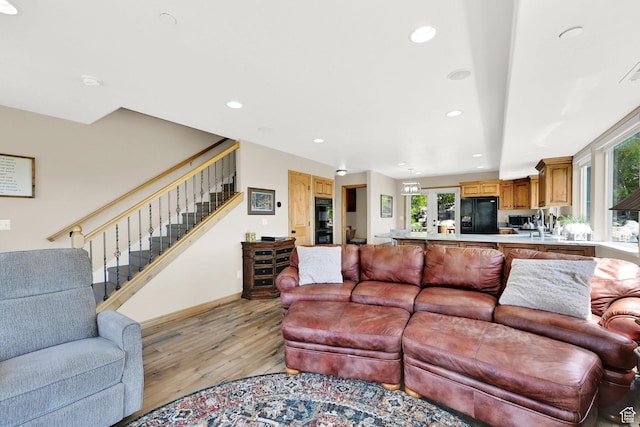 5063 E Lakeview Dr Unit 1001, Eden, UT 84310 - living area featuring light wood-style floors, recessed lighting, stairway, and baseboards