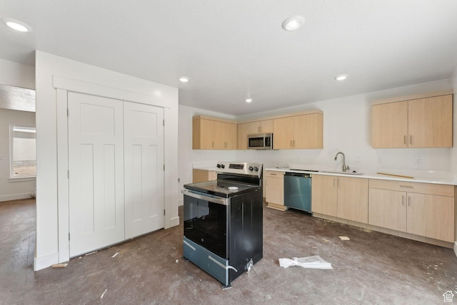 1615 N Angel St Unit D, Layton, UT 84041 - kitchen with light brown cabinets, stainless steel microwave, black / electric stove, dishwashing machine, and concrete floors