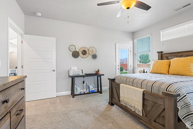 2738 W 270 N, Hurricane, UT 84737 - bedroom featuring light carpet, access to exterior, baseboards, and a ceiling fan