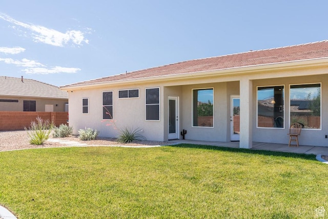 2738 W 270 N, Hurricane, UT 84737 - back of house with stucco siding and a patio area