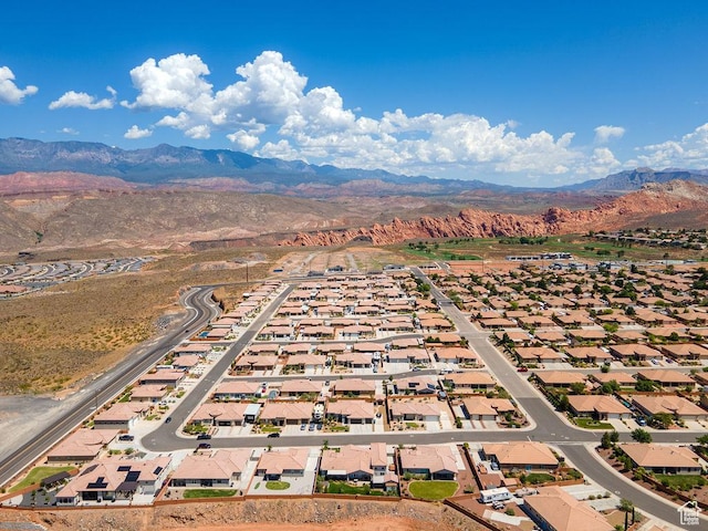 2738 W 270 N, Hurricane, UT 84737 - aerial overview of property's location featuring a mountain backdrop and nearby suburban area