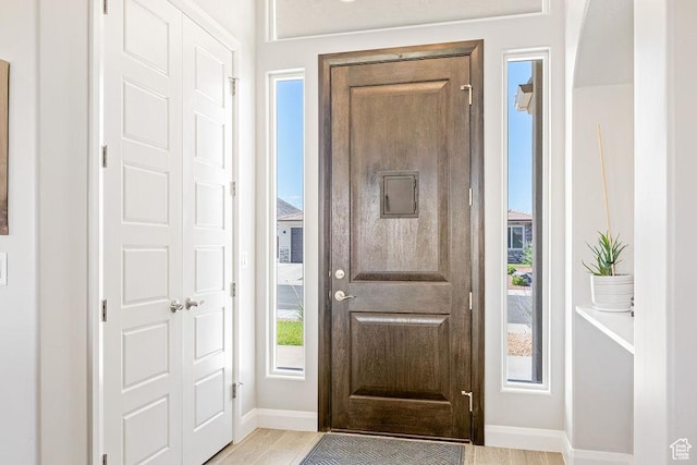 2738 W 270 N, Hurricane, UT 84737 - foyer with baseboards, healthy amount of natural light, and light wood-style floors