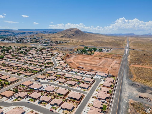 2738 W 270 N, Hurricane, UT 84737 - aerial overview of property's location with mountains and nearby suburban area
