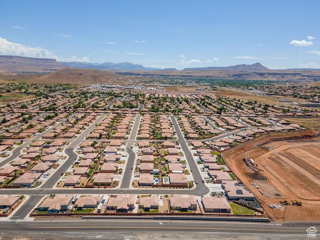 2738 W 270 N, Hurricane, UT 84737 - aerial overview of property's location with a mountain backdrop and nearby suburban area