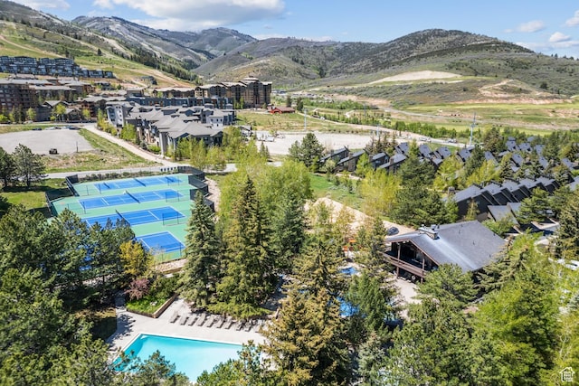 2025 Canyons Resort Dr Unit B7, Park City, UT 84098 - drone / aerial view of a pool and mountains