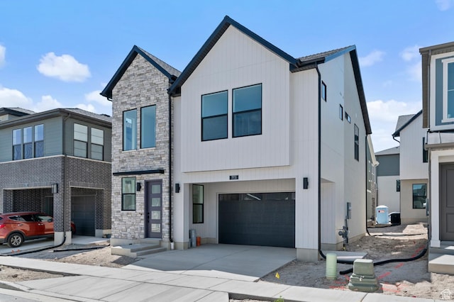 3931 W Red Clover Dr, Lehi, UT 84043 - modern home featuring stone siding, an attached garage, and driveway