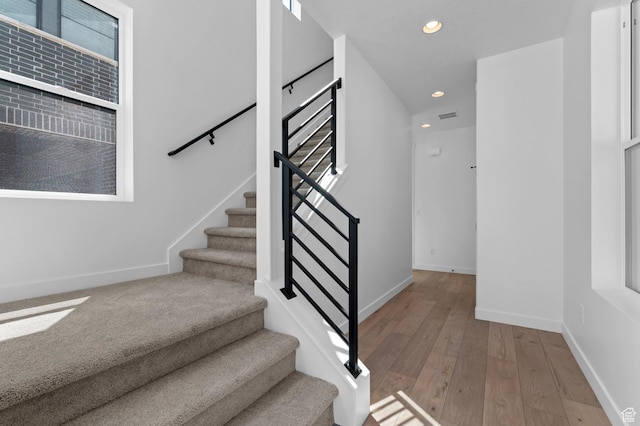 3931 W Red Clover Dr, Lehi, UT 84043 - stairs featuring recessed lighting, baseboards, and hardwood / wood-style flooring