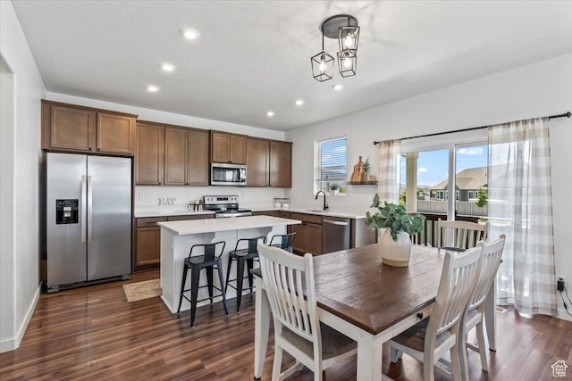 742 E Stonebriar Dr, Eagle Mountain, UT 84005 - dining area with recessed lighting, dark wood-type flooring, and baseboards