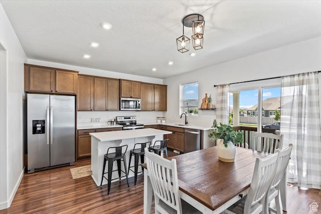742 E Stonebriar Dr, Eagle Mountain, UT 84005 - dining area with recessed lighting, dark wood-type flooring, and baseboards