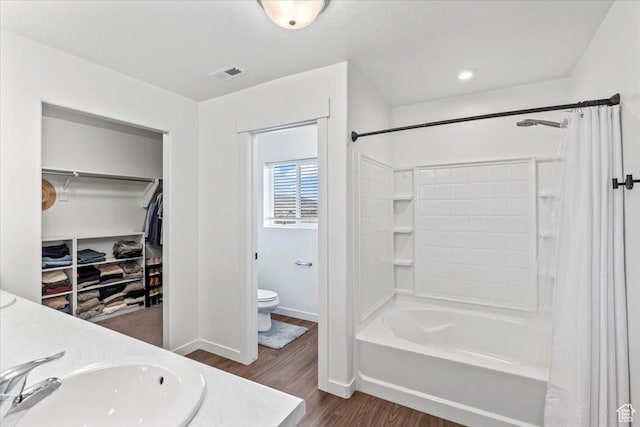 742 E Stonebriar Dr, Eagle Mountain, UT 84005 - full bath with wood finished floors, toilet, shower / bathtub combination with curtain, and vanity