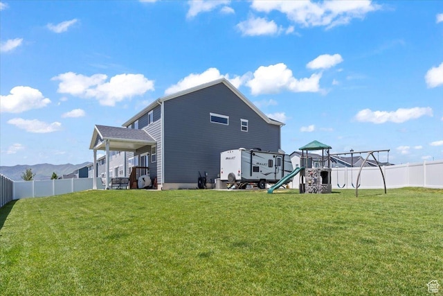 742 E Stonebriar Dr, Eagle Mountain, UT 84005 - rear view of property with a playground