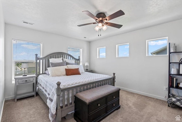 742 E Stonebriar Dr, Eagle Mountain, UT 84005 - bedroom with light colored carpet, baseboards, and a ceiling fan