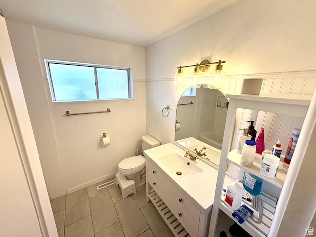 776 S Cherry Dr W, Orem, UT 84058 - bathroom featuring toilet, vanity, tile patterned floors, and baseboards