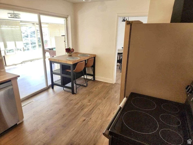 776 S Cherry Dr W, Orem, UT 84058 - dining room with light wood finished floors and baseboards
