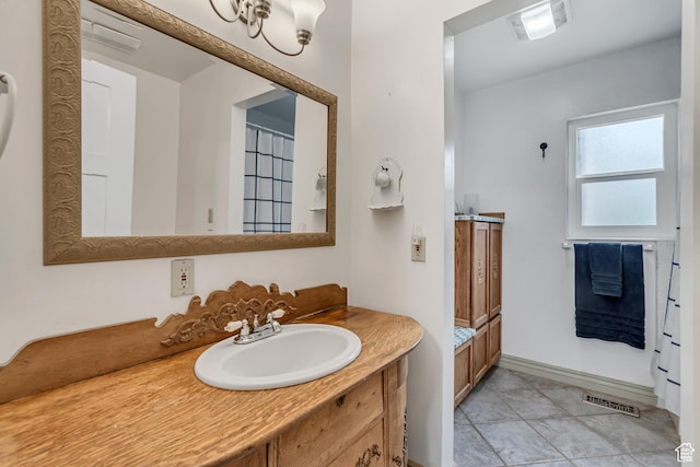 233 N Main St, Alpine, UT 84004 - bathroom featuring vanity and baseboards