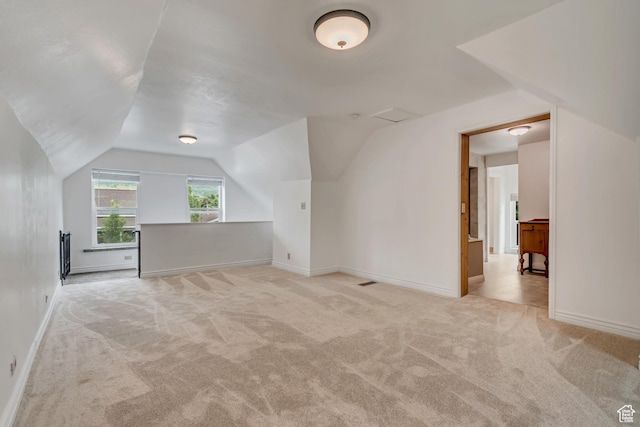 233 N Main St, Alpine, UT 84004 - bonus room featuring light carpet, vaulted ceiling, and baseboards