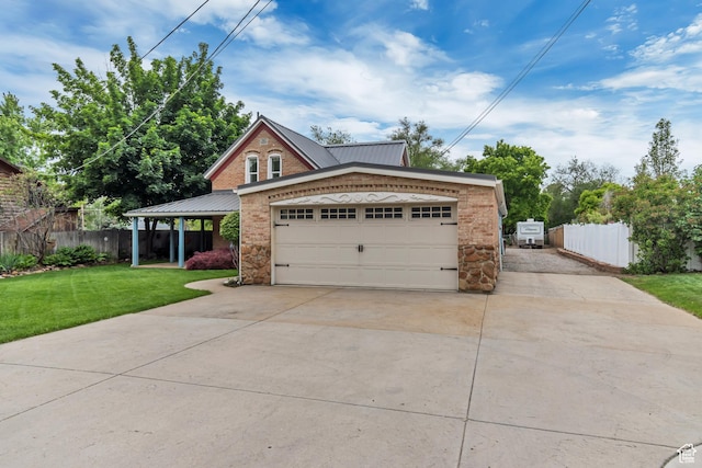 233 N Main St, Alpine, UT 84004 - view of front of home with concrete driveway, metal roof, stone siding, and a garage