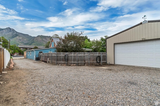 233 N Main St, Alpine, UT 84004 - detached garage featuring a mountain view and central AC